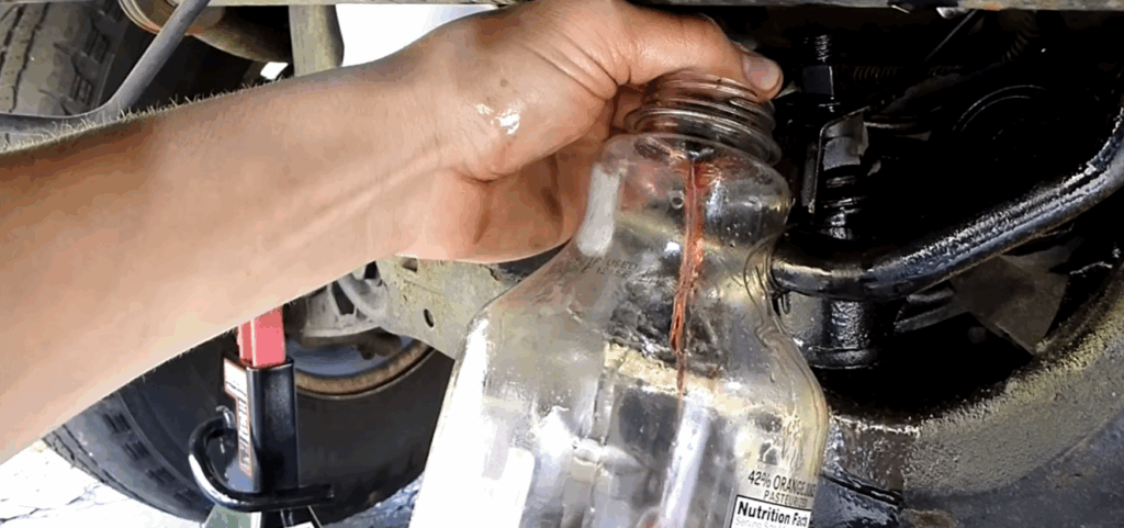 Image showing adding ew power steering fluid 