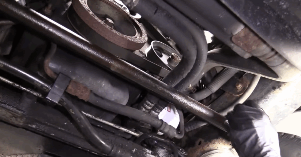 Image showing mechanic locating the source of a power steering leak