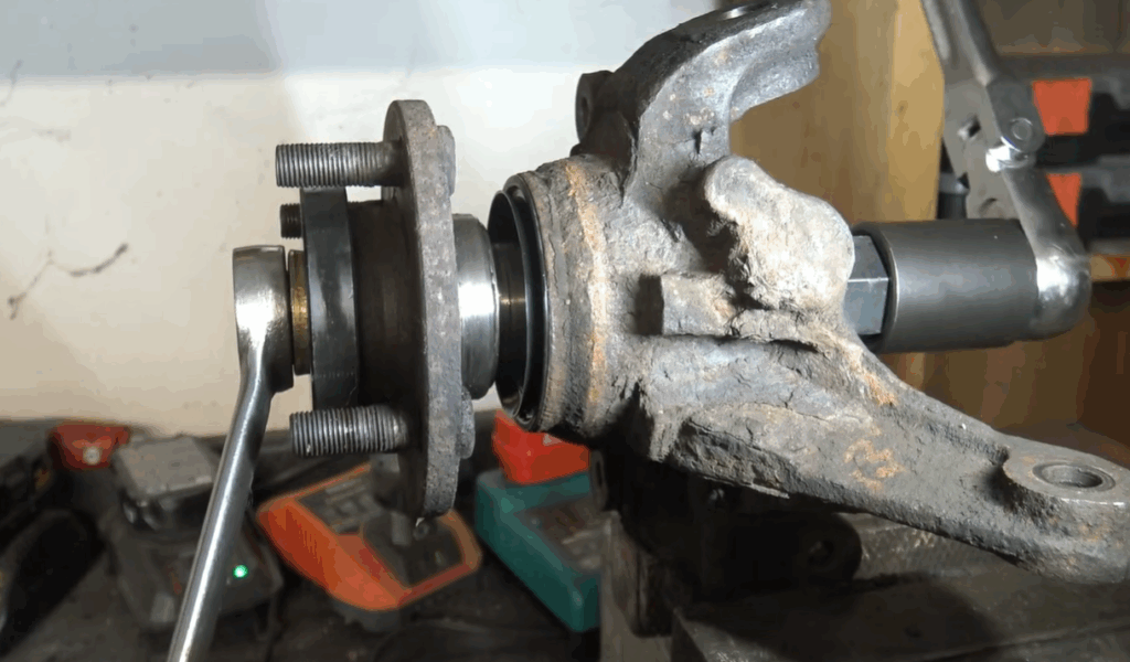Image showing the reassembly and torque of a new wheel bearing
